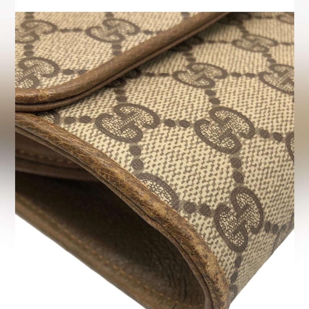Gucci Brown Monogram Clutch with Gold Accent - Picture 5 of 11
